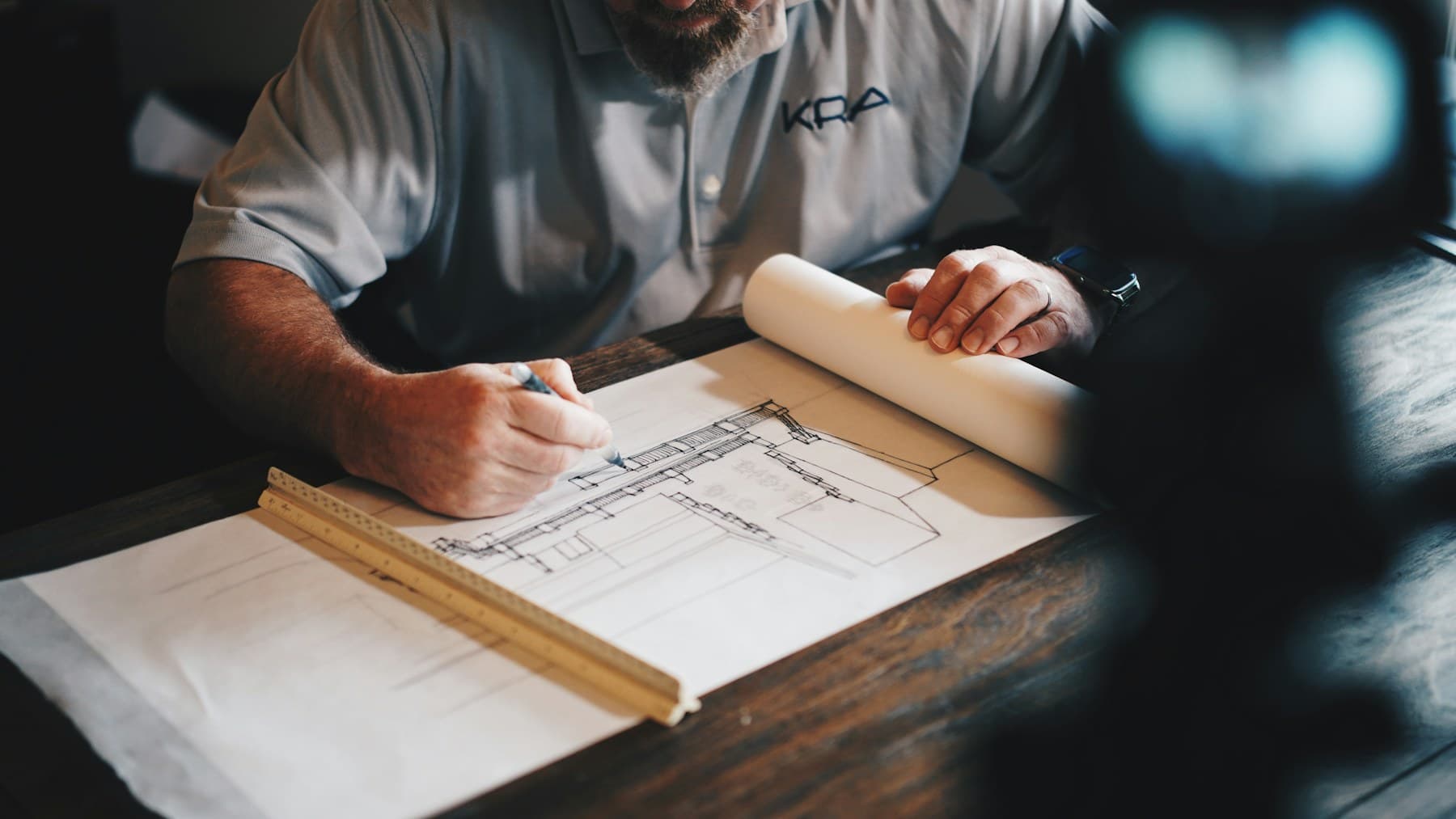 Architect developing a drawing, representative imagery